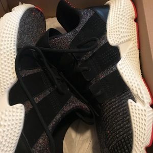 Adidas. BRAND NEW. Ladies. Size 9.